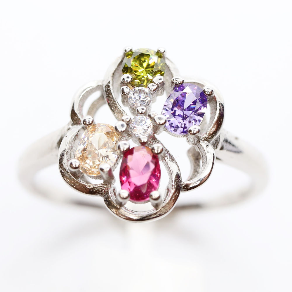 Anillo Flor 4Estaciones Plata .925 Baño Rodio y Zirconias