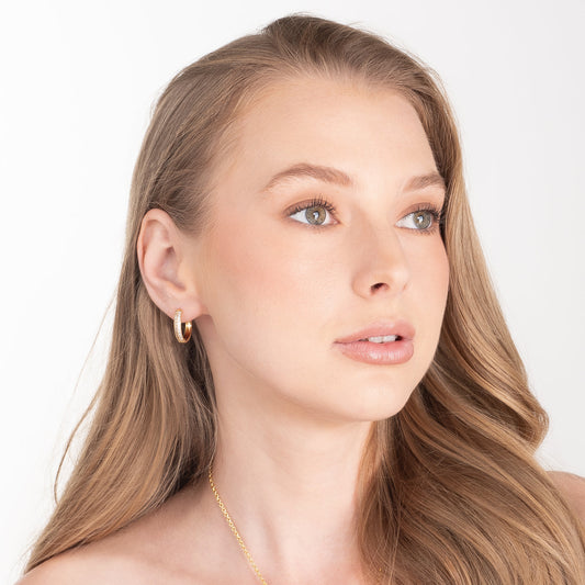 Arracadas con Oro y piedras tono cristal pulido