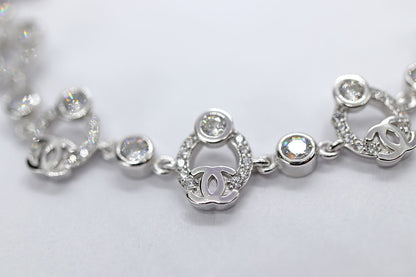 Pulsera Círculo - Plata .925 con Baño en Rodio y Zirconias