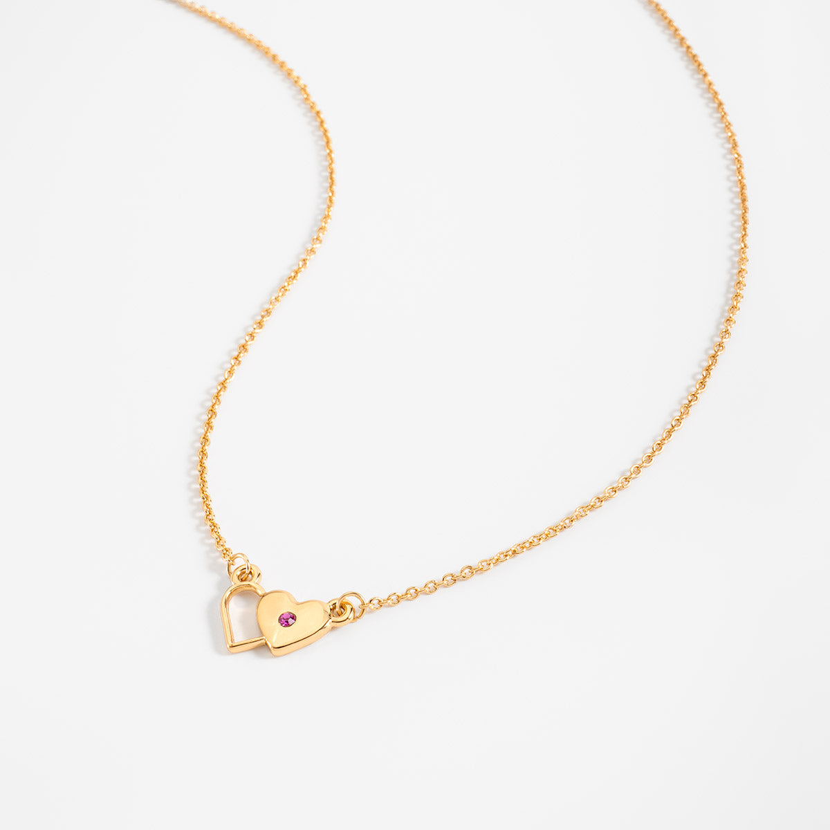 Collar en baño de oro corazones piedra toque brillante