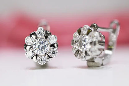 Huggies Flor L925 con Baño de Rodio y Zirconias