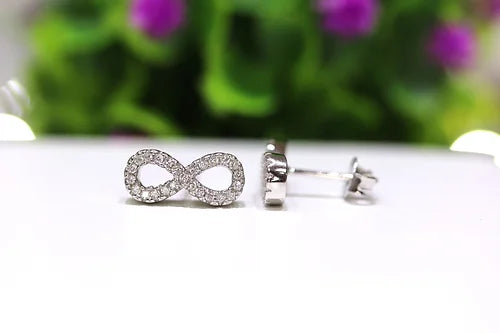 Aretes Infinito Plata 925Baño Rodio y Zirconias