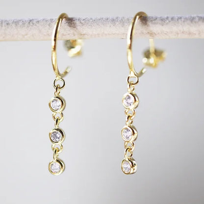 Aretes largos 3 Zirconias Plata .925 Baño Rodio