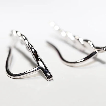 Arete Clip Hojas Plata .925 baño Rodio