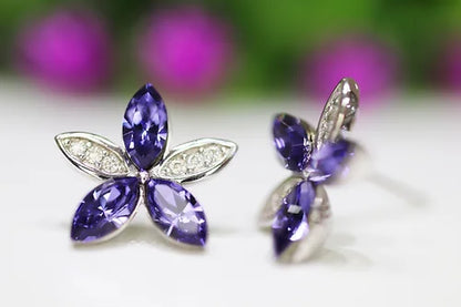 Aretes Flor Morada Plata .925 con Baño de Rodio y Zirconias