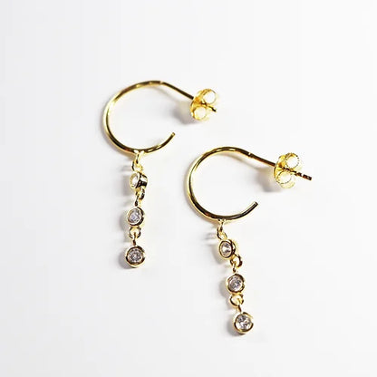 Aretes largos 3 Zirconias Plata .925 Baño Rodio