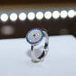 Anillo Ojito Cz azules y blanca Plata 925 baño Rodio