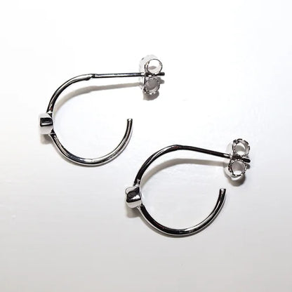 Arracadas Ojos Cz Claras Plata .925 baño Rodio