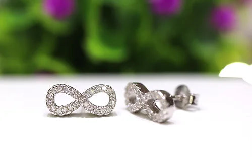 Aretes Infinito Plata 925Baño Rodio y Zirconias